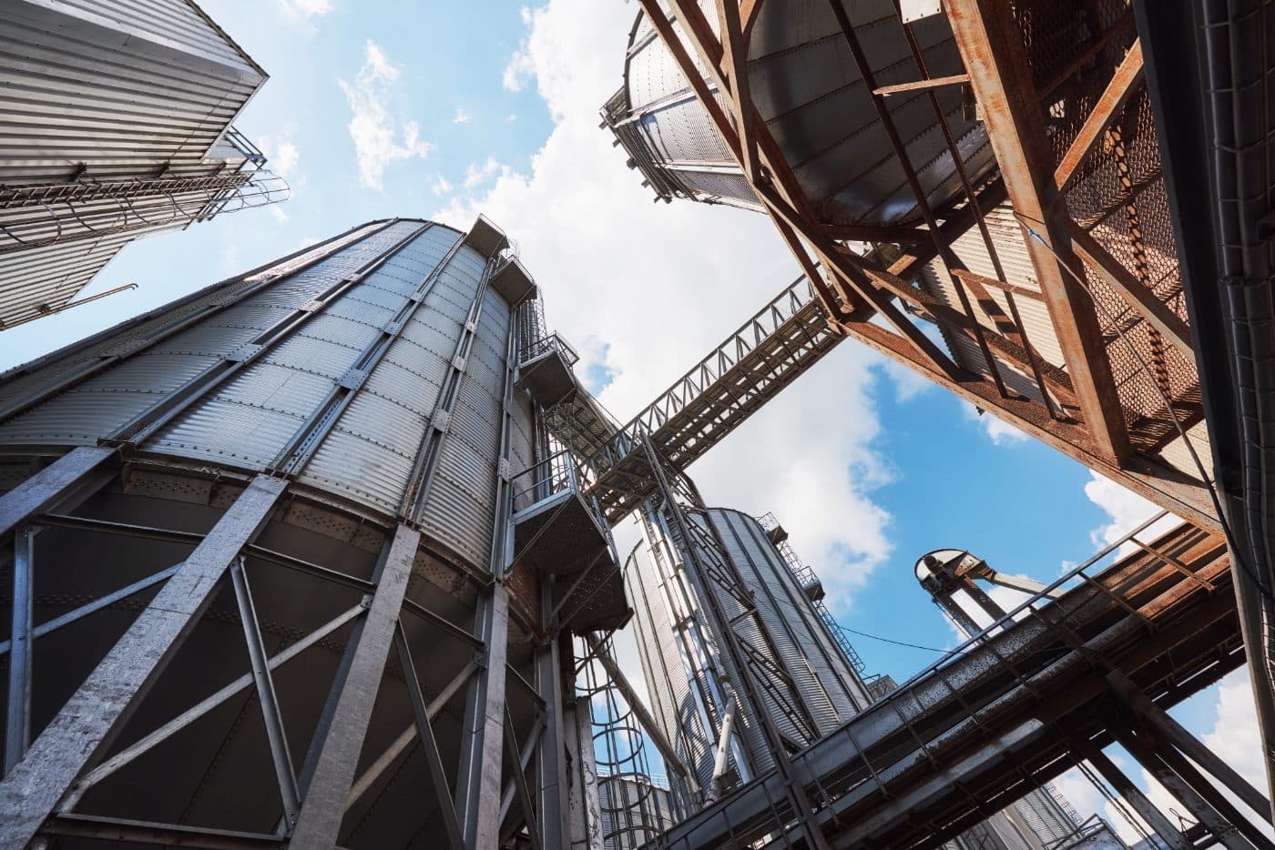 Steel silo and conveyor structure against the sky